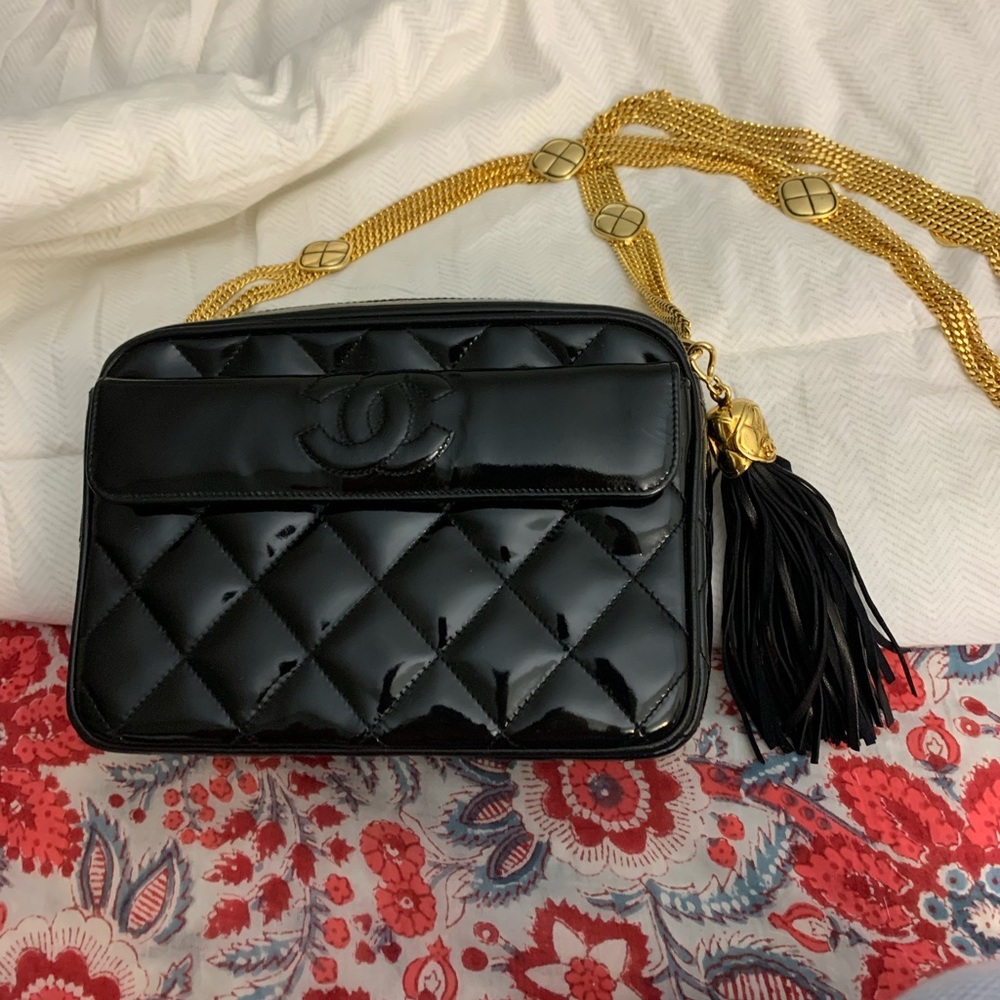CHANEL Black Quilted Patent Leather Crossbody with Gold Chain and Tassel